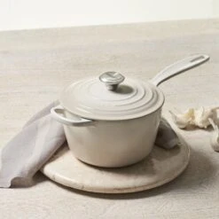 Le Creuset 2.25 Qt. Signature Enameled Cast Iron Saucepan With Stainless Steel Knob | Meringue White 6 Le Creuset 2.25 Qt. Signature Enameled Cast Iron Saucepan With Stainless Steel Knob | Meringue White -Kitchen Supplies mer1 1