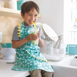 Danica Jubilee Kid's Apron | Dino Daydream -Kitchen Supplies nd s20 back cover style