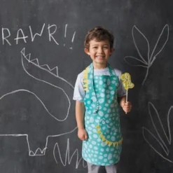 Danica Jubilee Kid's Apron | Dino Daydream -Kitchen Supplies nd s20 collection dinosaur style