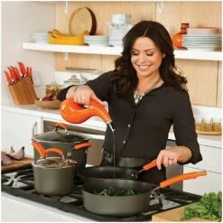 Rachael Ray Hard Anodized II Cookware Set W/ Orange Handles: 10pc -Kitchen Supplies rachael ray evoo bottles in use kitchen setting compressed 6 1