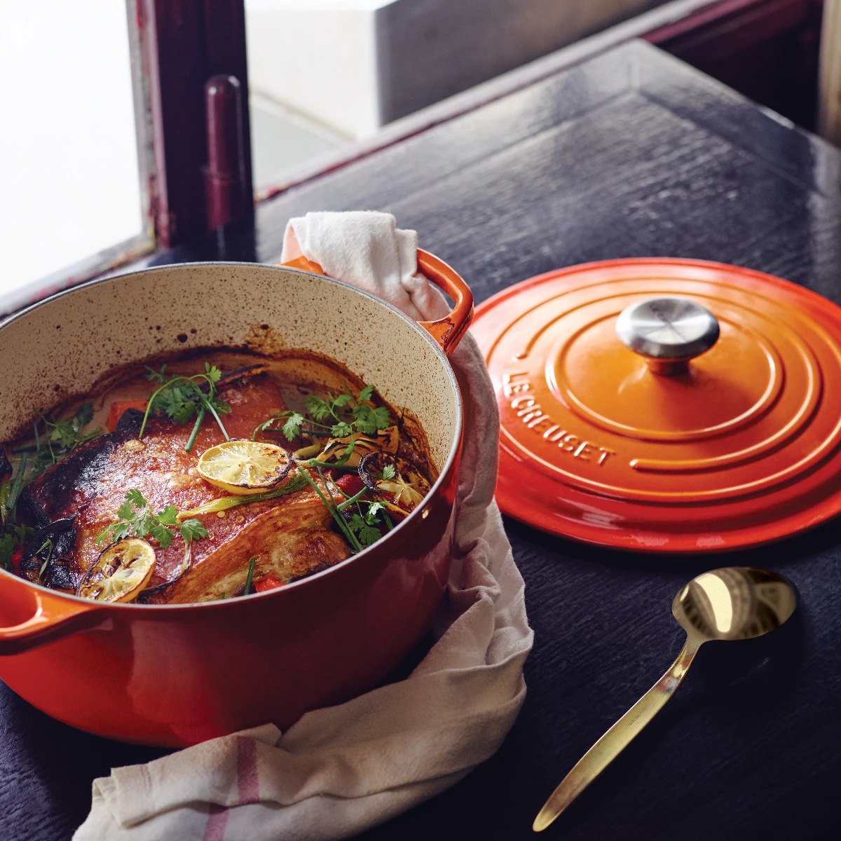 Le Creuset 5.5 Qt. Round Signature Cast Iron Dutch Oven With Stainless Steel Knob | Flame Orange 4 Le Creuset 5.5 Qt. Round Signature Cast Iron Dutch Oven With Stainless Steel Knob | Flame Orange - Image 4