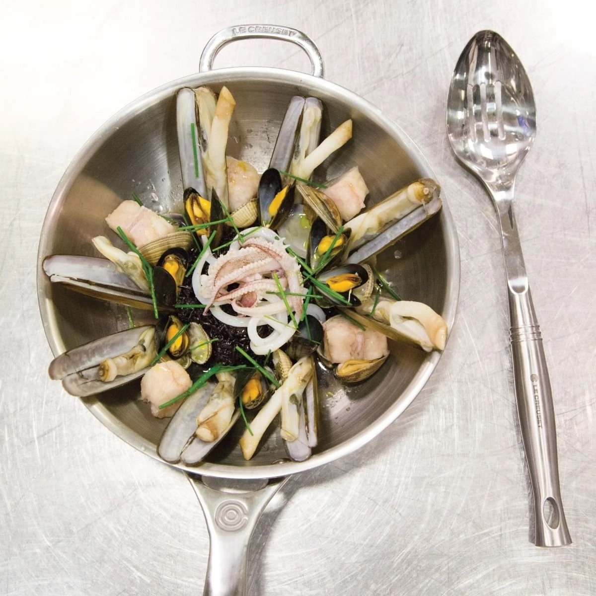 Le Creuset 3.5 Qt. Tri-Ply Stainless Steel Saucier Pan With Lid & Helper Handle 3 Le Creuset 3.5 Qt. Tri-Ply Stainless Steel Saucier Pan With Lid & Helper Handle - Image 3